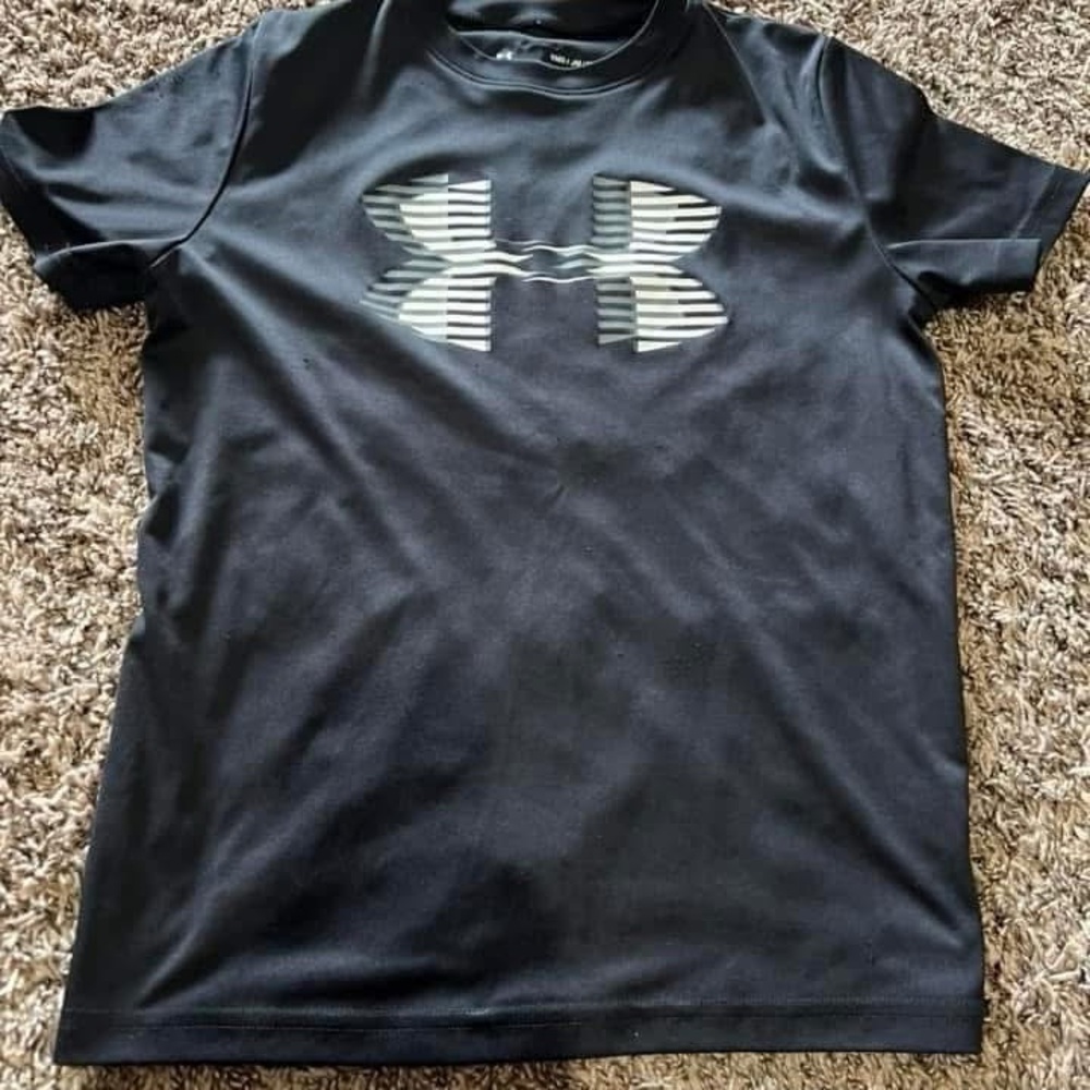 Under Armour youth medium boys blue and black.  Both together.